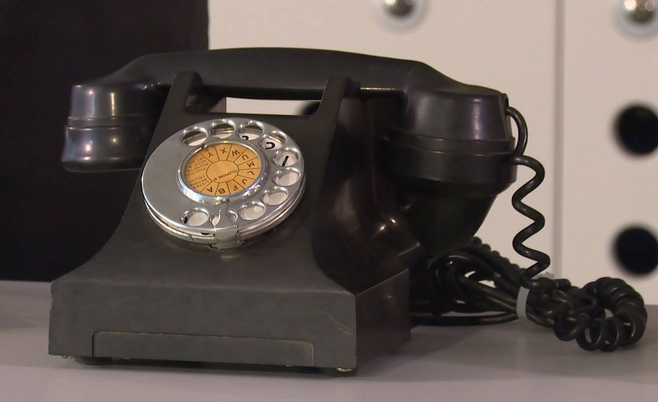 Old-style rotary dial telephone