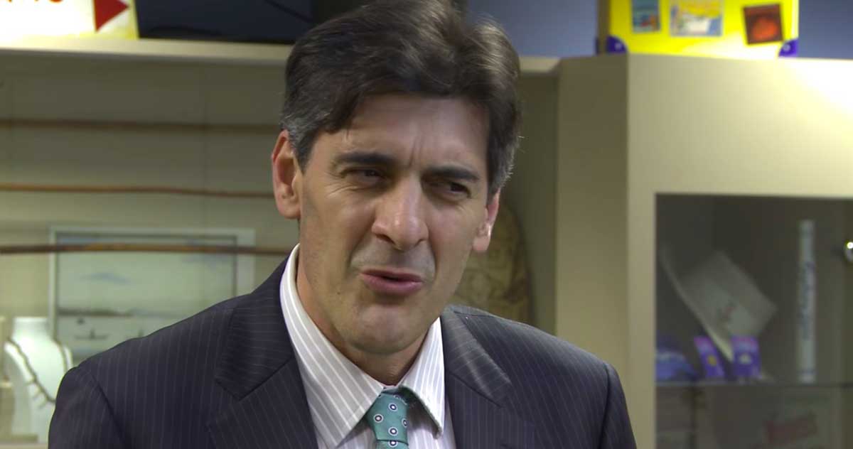 Film still of George Megalogenis discussing the eight-hour day.