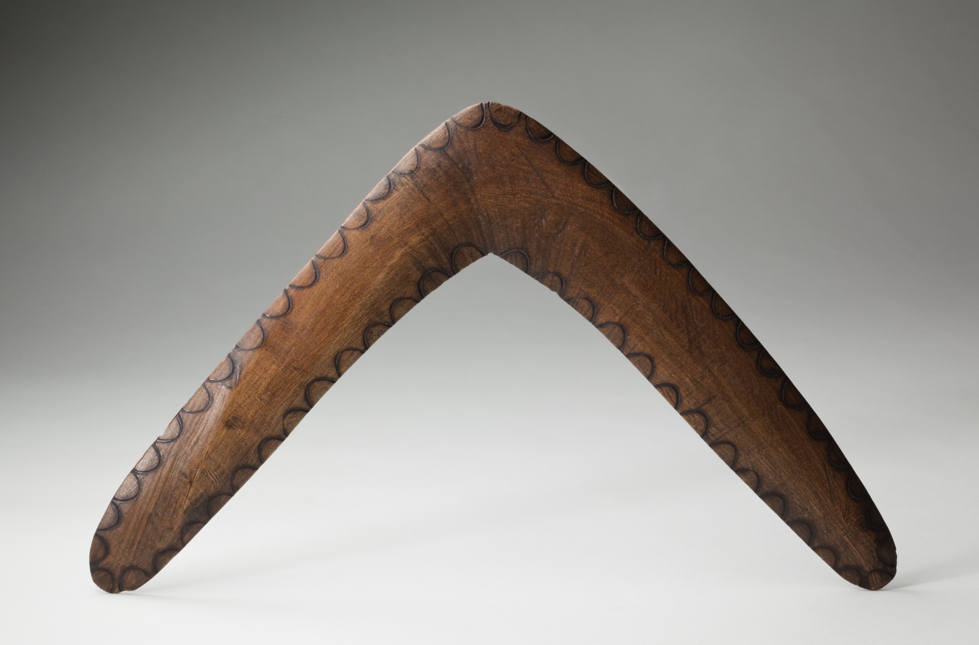  Boomerang with carved decorations, attributed to Robert Wandin, Coranderrk, 1890s.