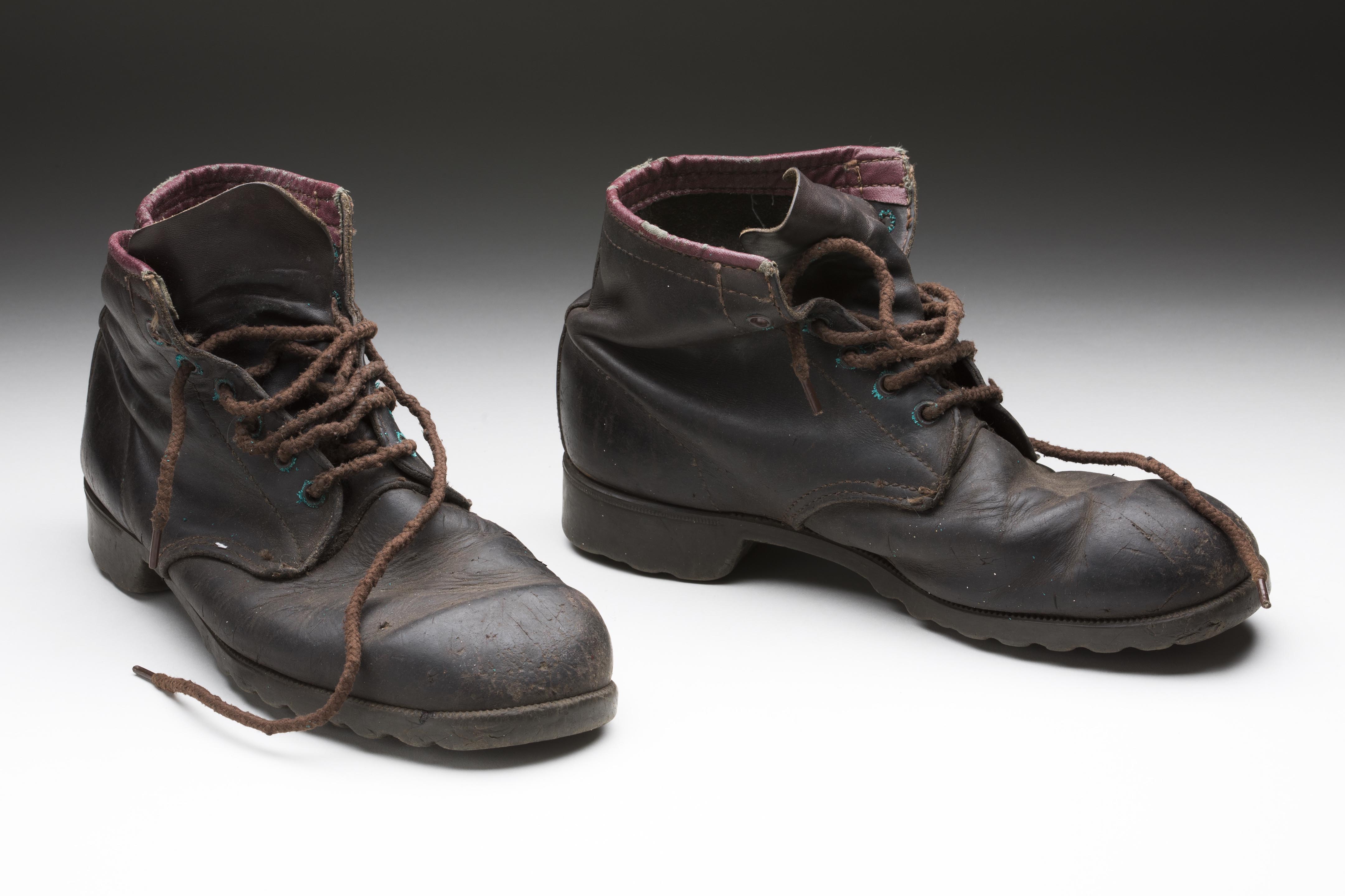Dark brown leather hiking boots from the Milo Dunphy collection.