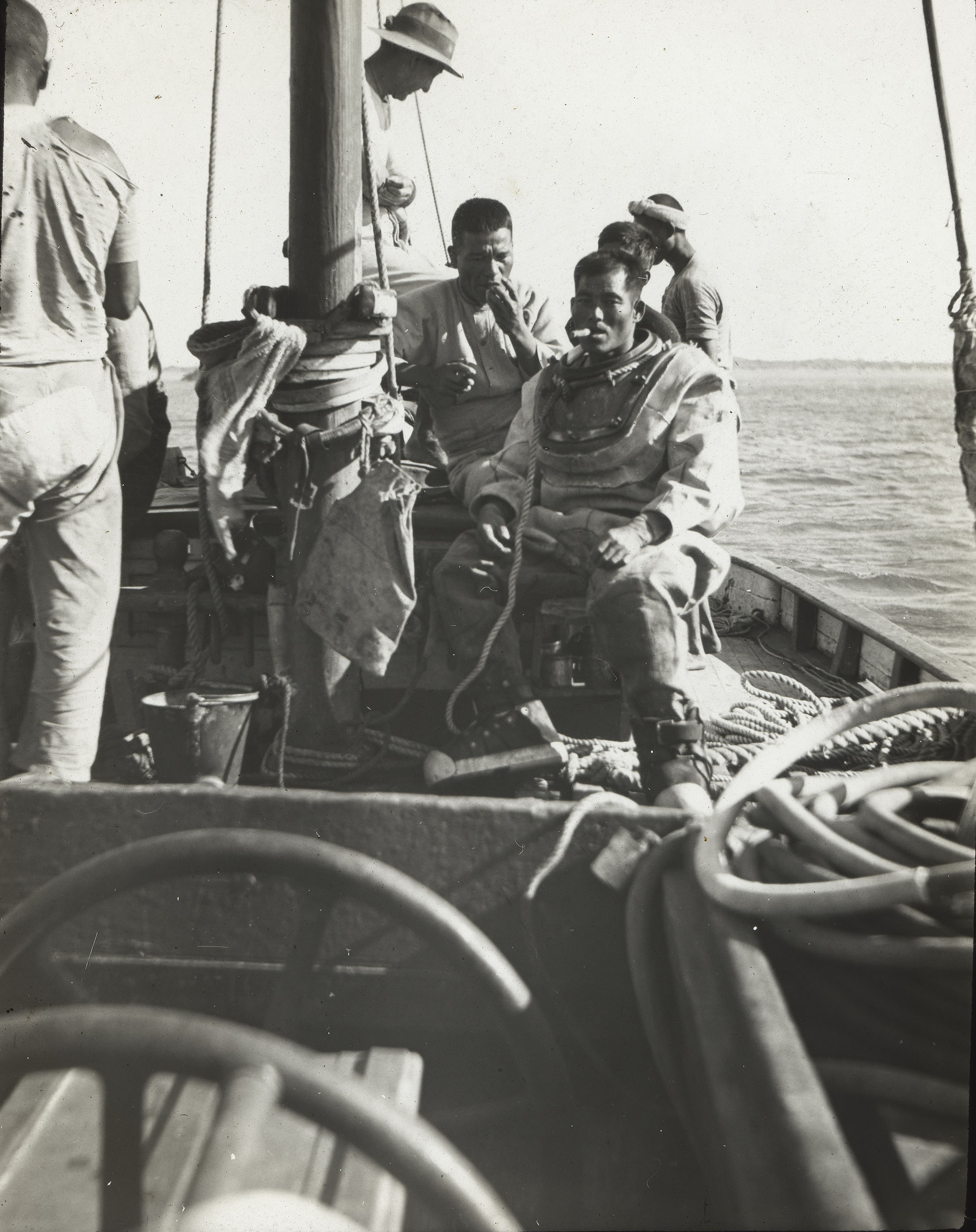 Japanese crew on a boat owned by Victor Kepert (in the hat), Broome, about 1914 or early 1920s.