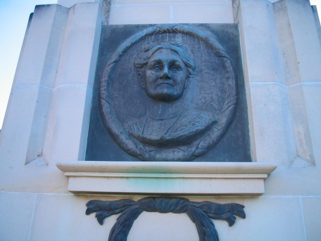 Memorial featuring Edith Cowan's portrait in bronze or stone.
