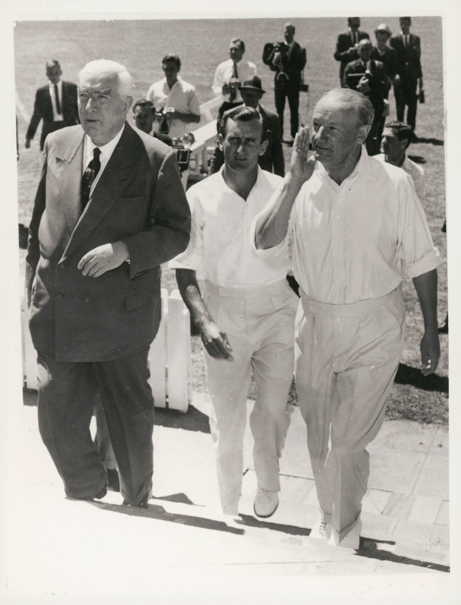 <p>Sir Robert Menzies (left) with cricketers Ted Dexter and Don Bradman (right) at Manuka Oval, Canberra, 1963</p>
