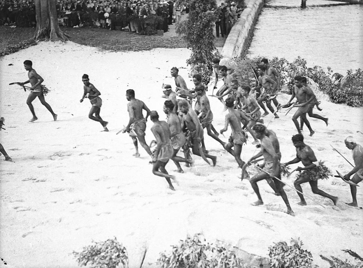 Aboriginal people forced to participate in the sesquicentenary re-enactment of Captain Phillip’s landing at Farm Cove.