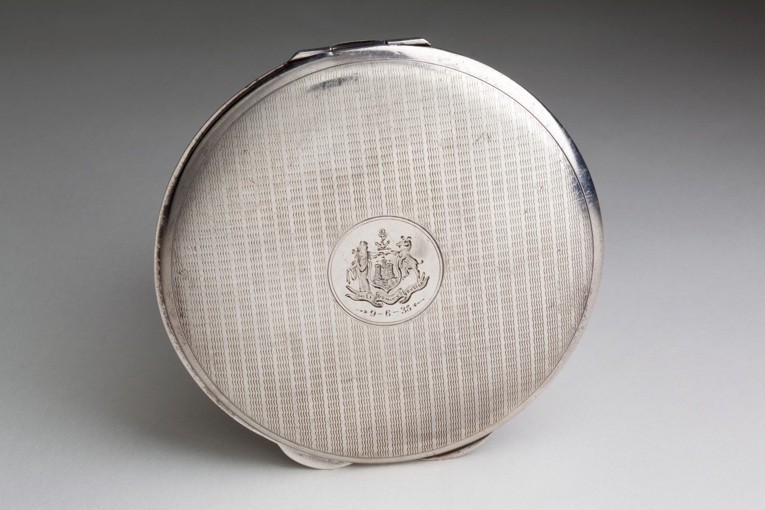 Face powder compact presented to Dame Enid Lyons.