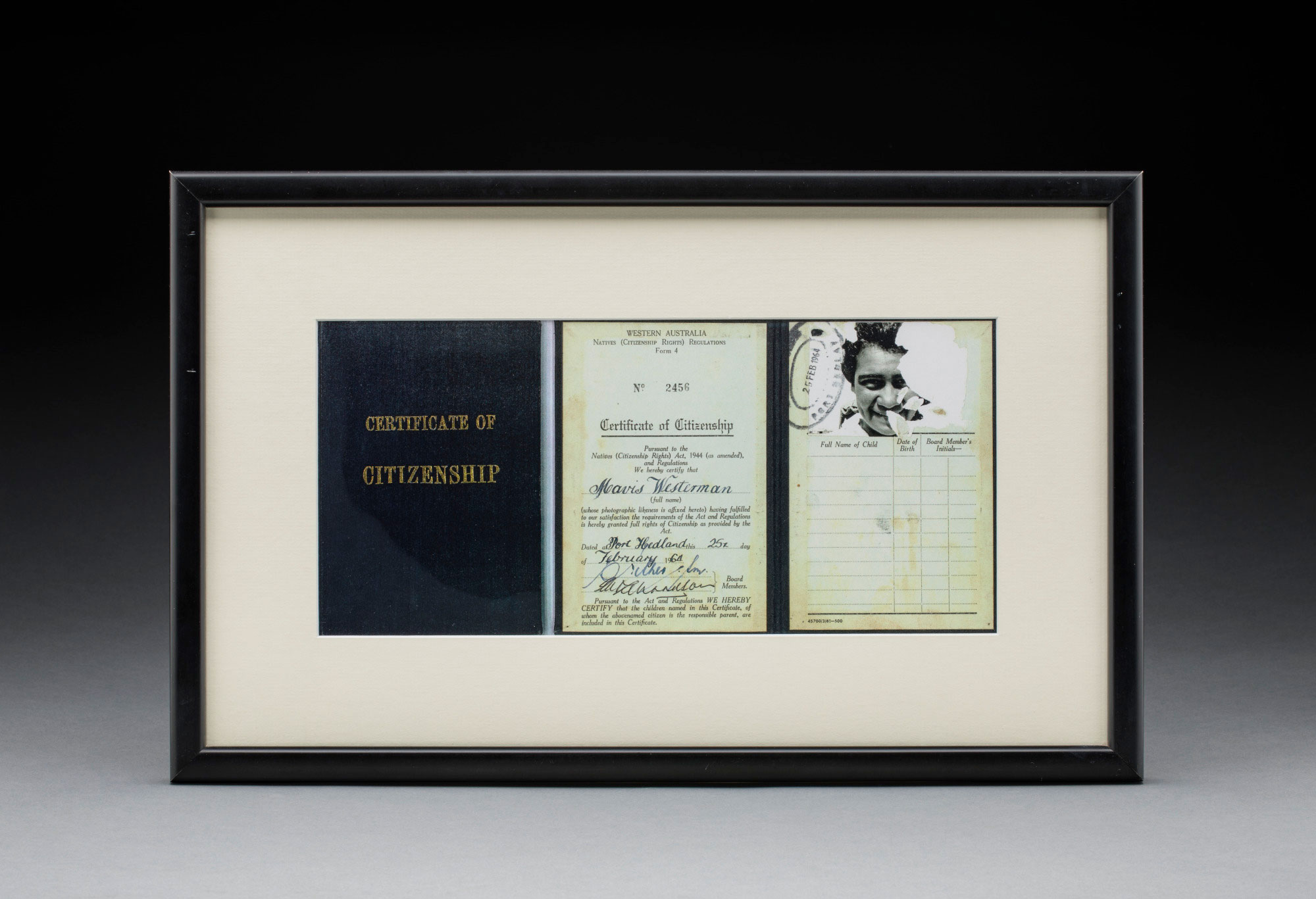 Framed citizenship certificate.