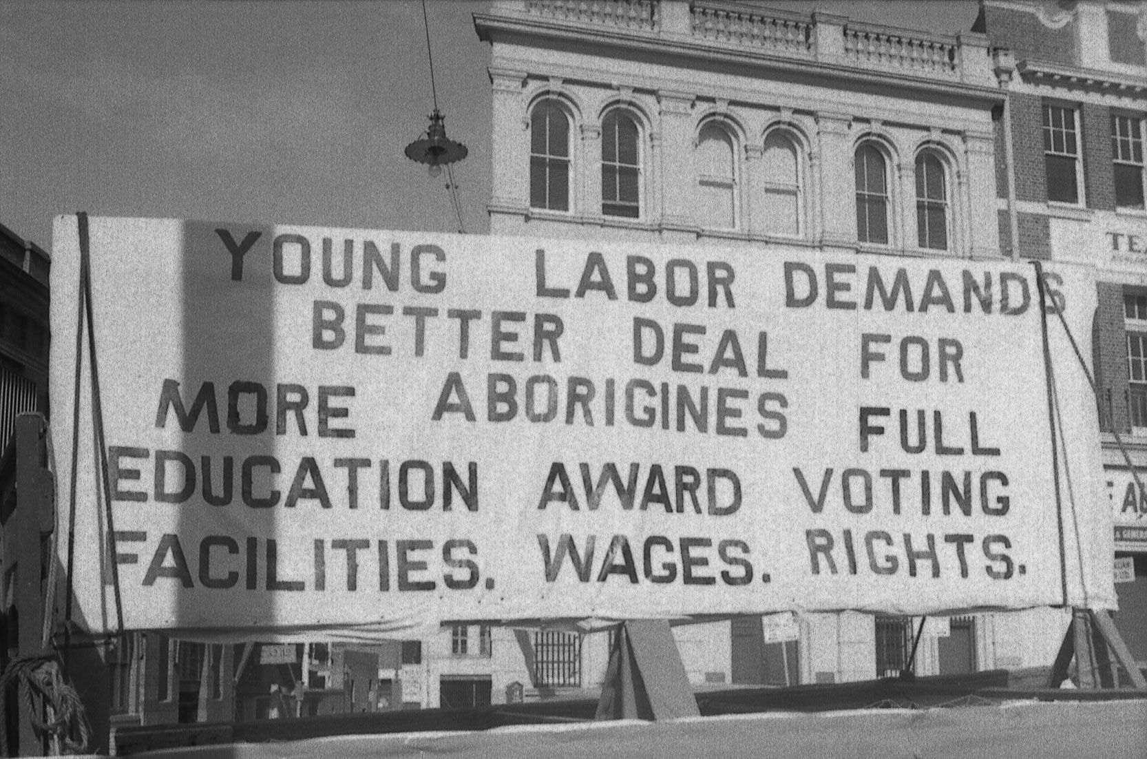 Young Labor banner on Aboriginal rights, May Day procession, 1965.