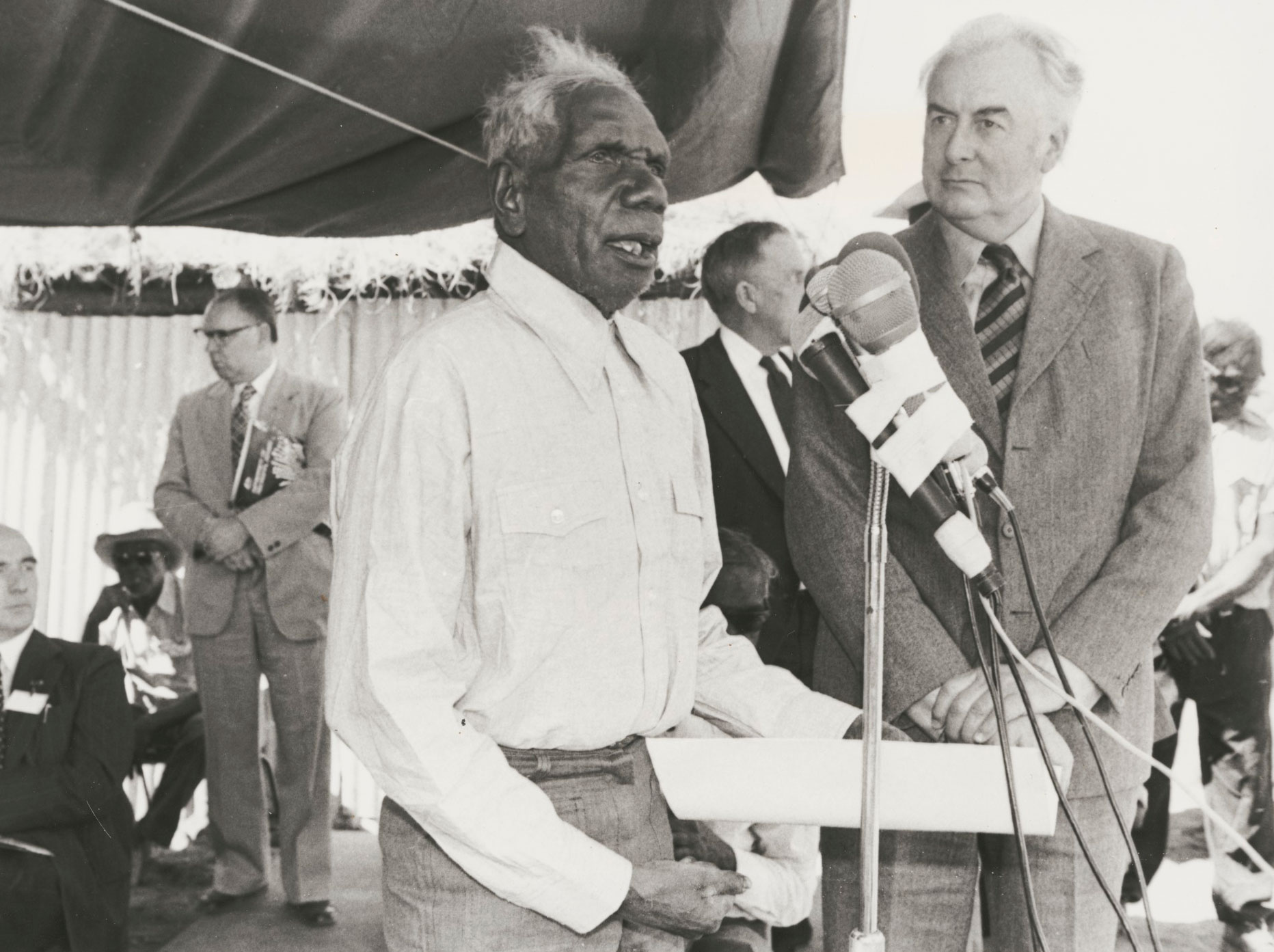 Vincent Lingiari addressing the media after Prime Minister Gough Whitlam officially returns Aboriginal land at Wattie Creek, Northern Territory, August 1975.