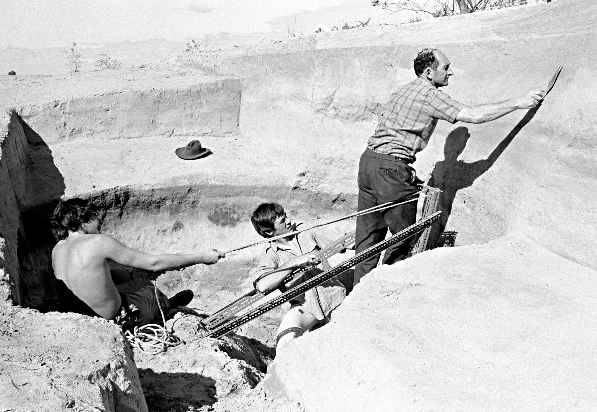 <p>Archaeologist John Mulvaney (right) at Lake Mungo, 1974</p>