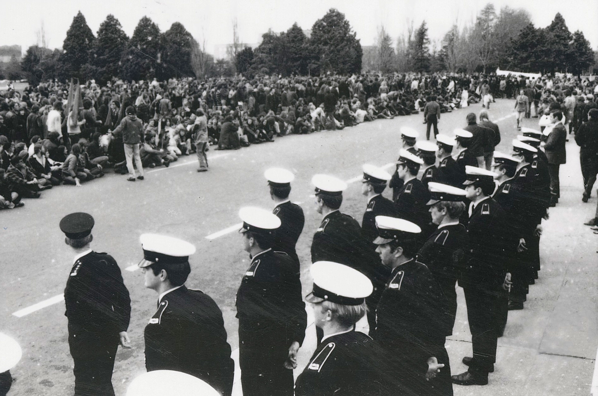 View from Parliament House of police and protesters at a land rights demonstration, Canberra, 30 July 1972.