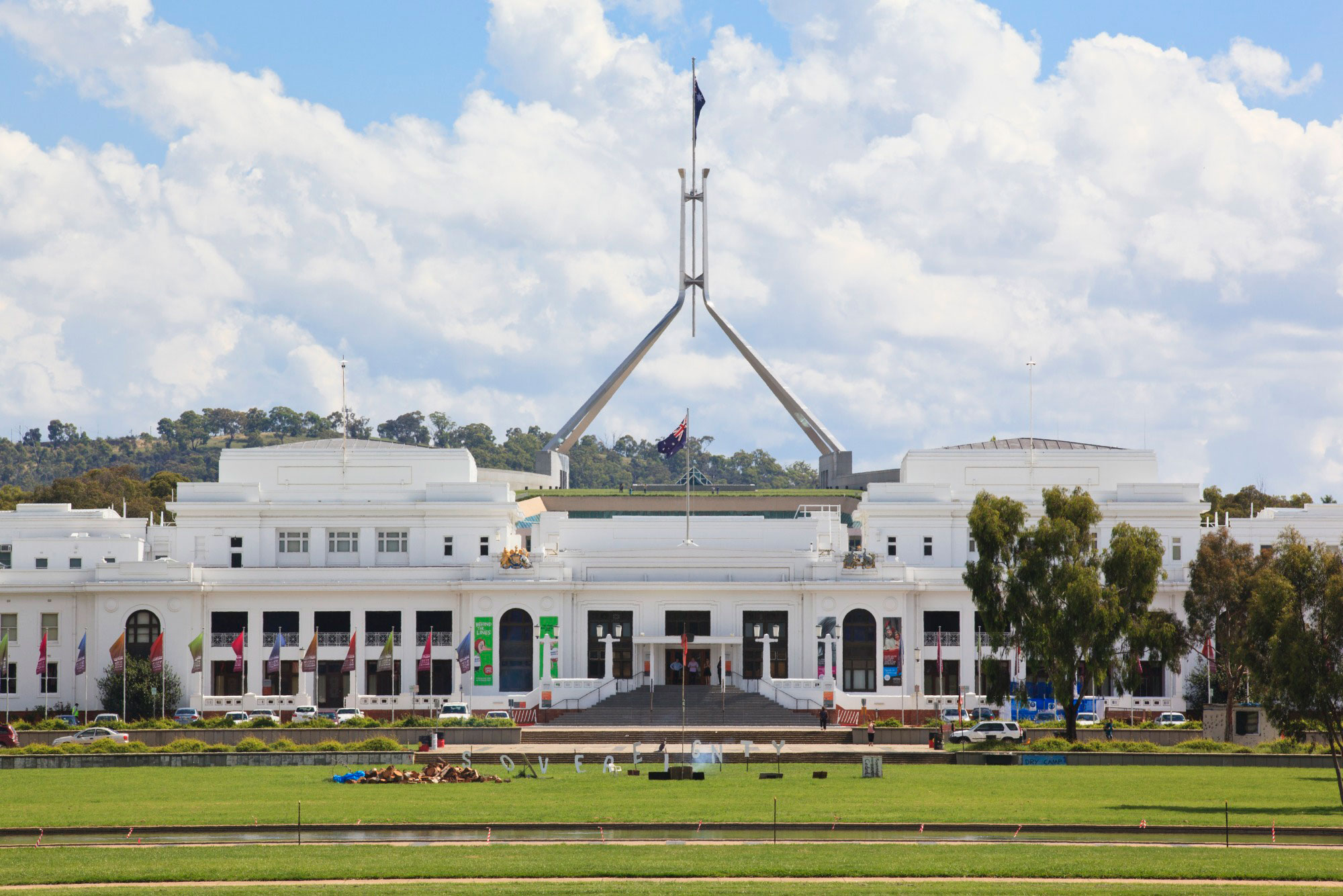 Old Parliament House with Aboriginal Tent Embassy signage.
