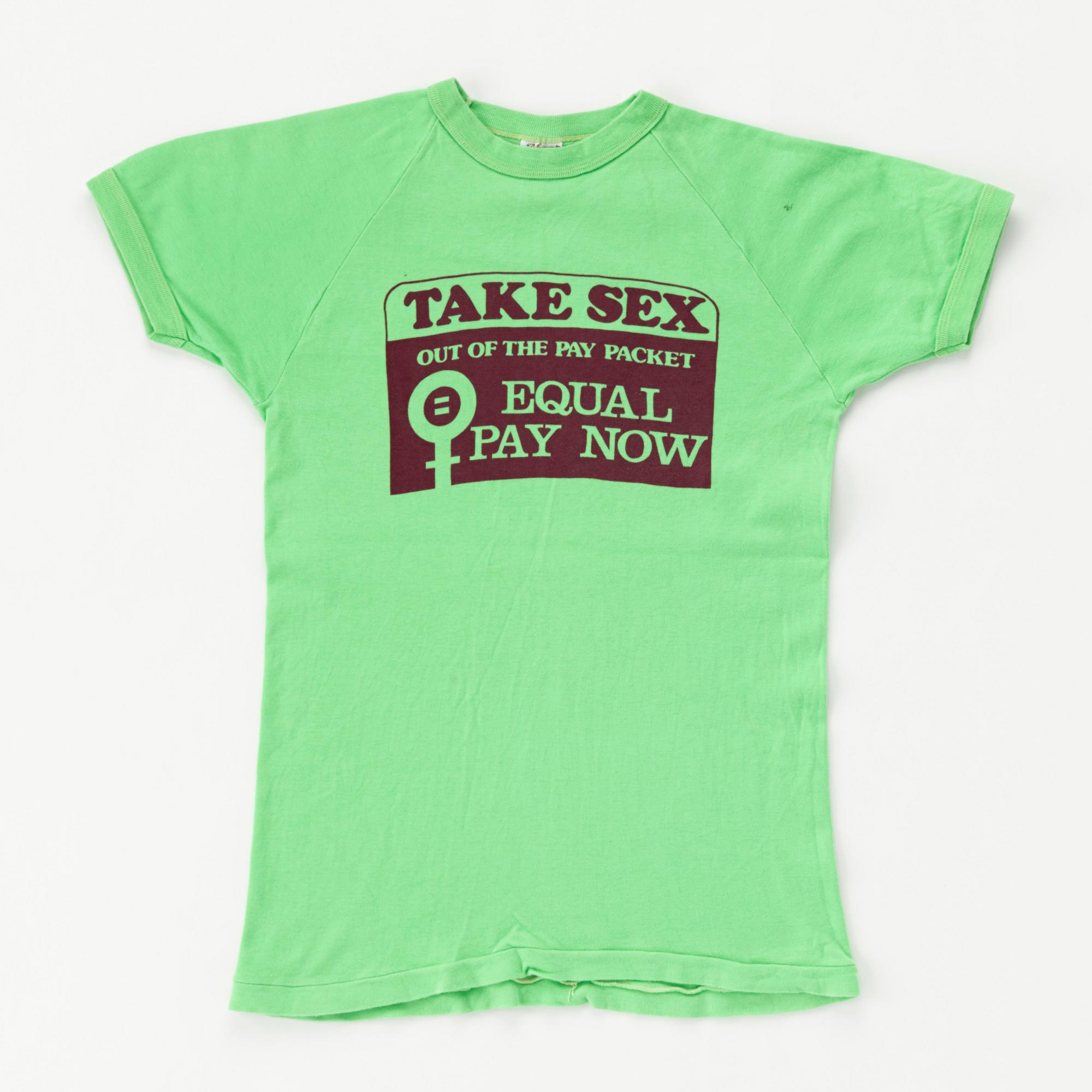 ‘Take sex out of the pay packet, equal pay now’ printed t-shirt.