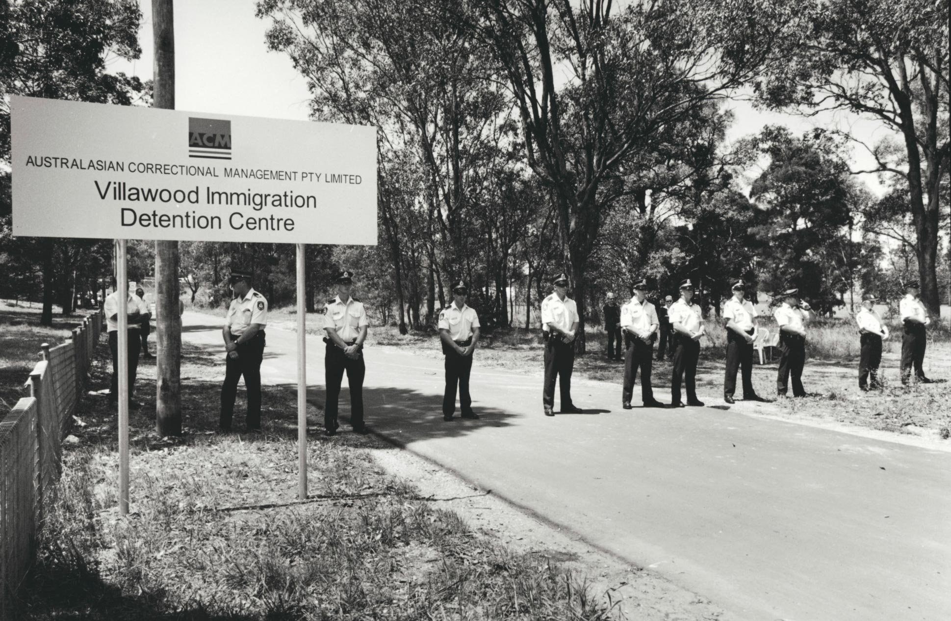 Police security line at Villawood Immigration Detention Centre, Sydney, January 2002.