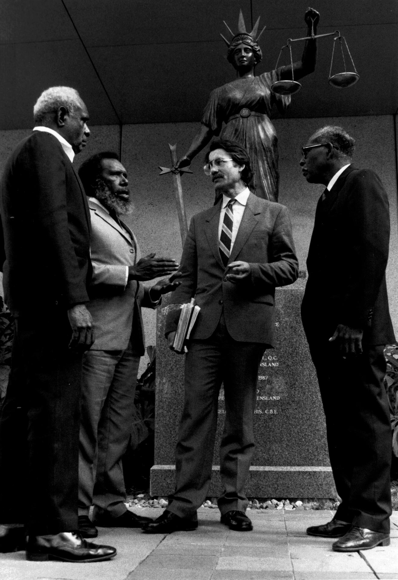 <p>From left: Dave Passi, Eddie Mabo, barrister Bryan Keon-Cohen and James Rice outside the Queensland Supreme Court, 1989</p>