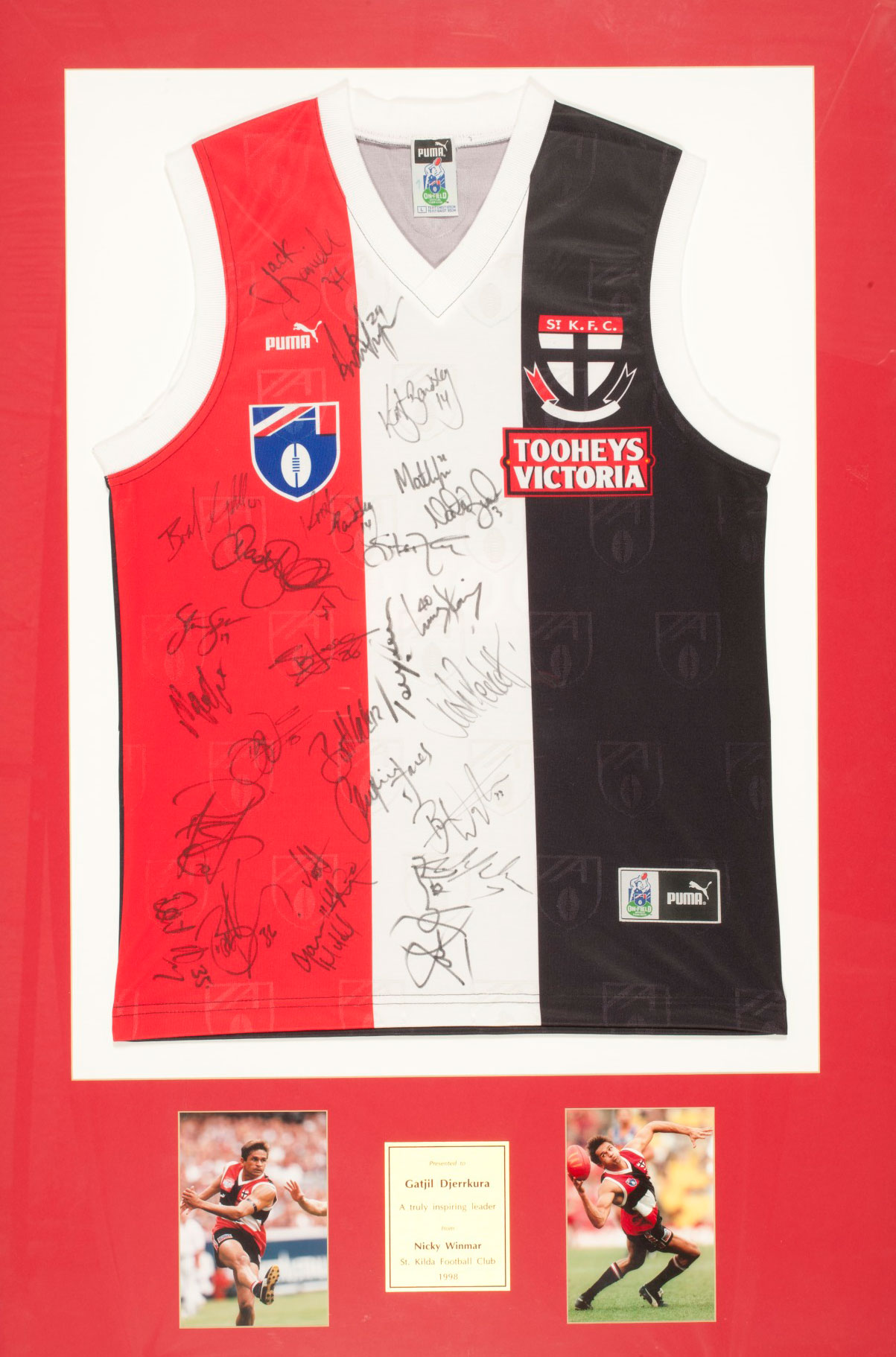 Framed and signed St Kilda Football Club jersey.