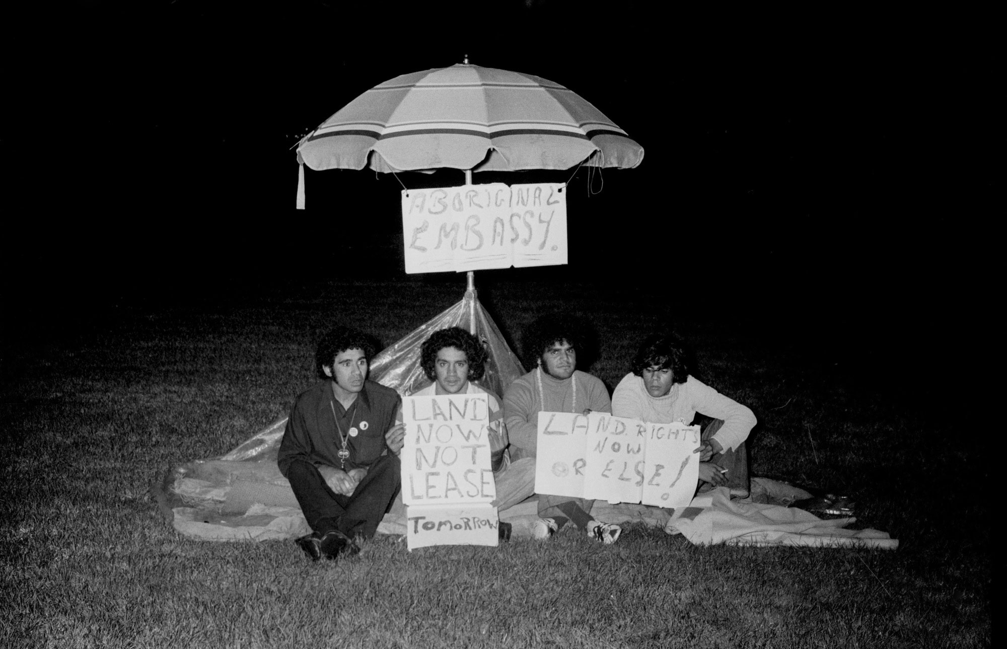 The original Aboriginal Tent Embassy on Australia Day, 26 January 1972. L-R: Michael Anderson, Billie Craigie, Bert Williams and Tony Coorey.