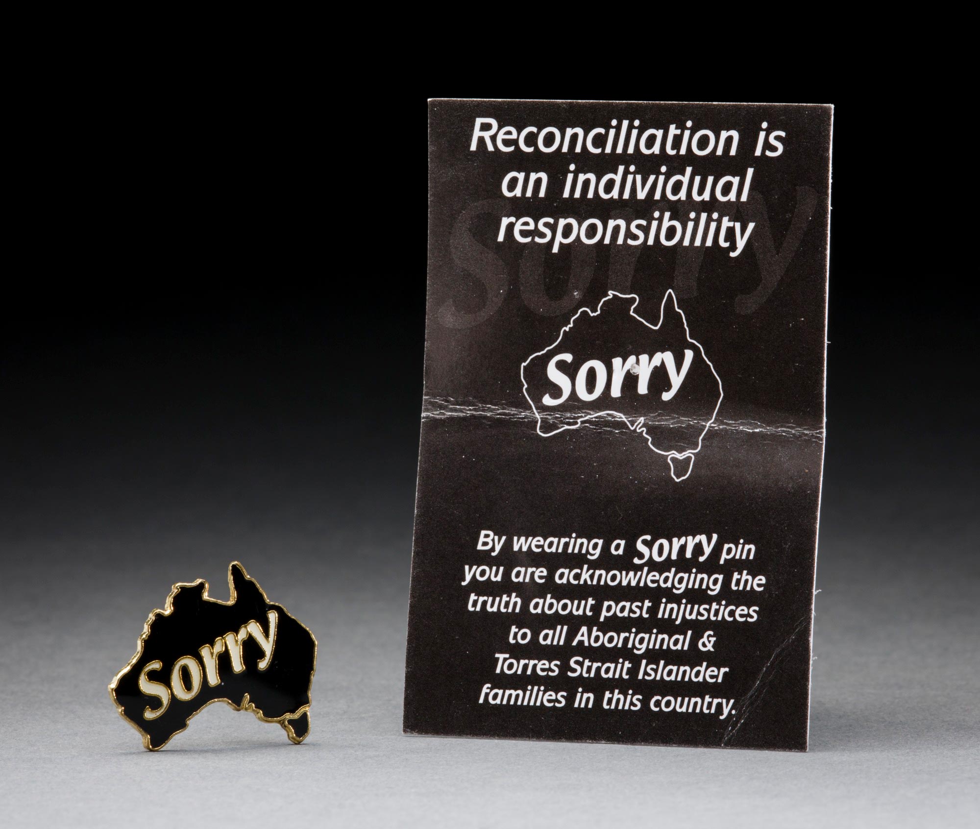 Sorry badge and card produced by Link-Up.