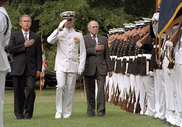 US President George W Bush and Prime Minister John Howard review marines at the Washington Navy Yard, 10 September 2001.