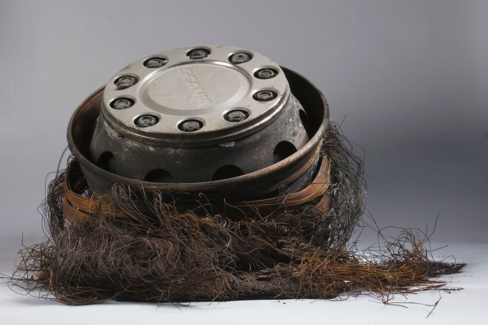 Burnt fire truck wheel, from a fire truck damaged in the 2003 Canberra bushfires.