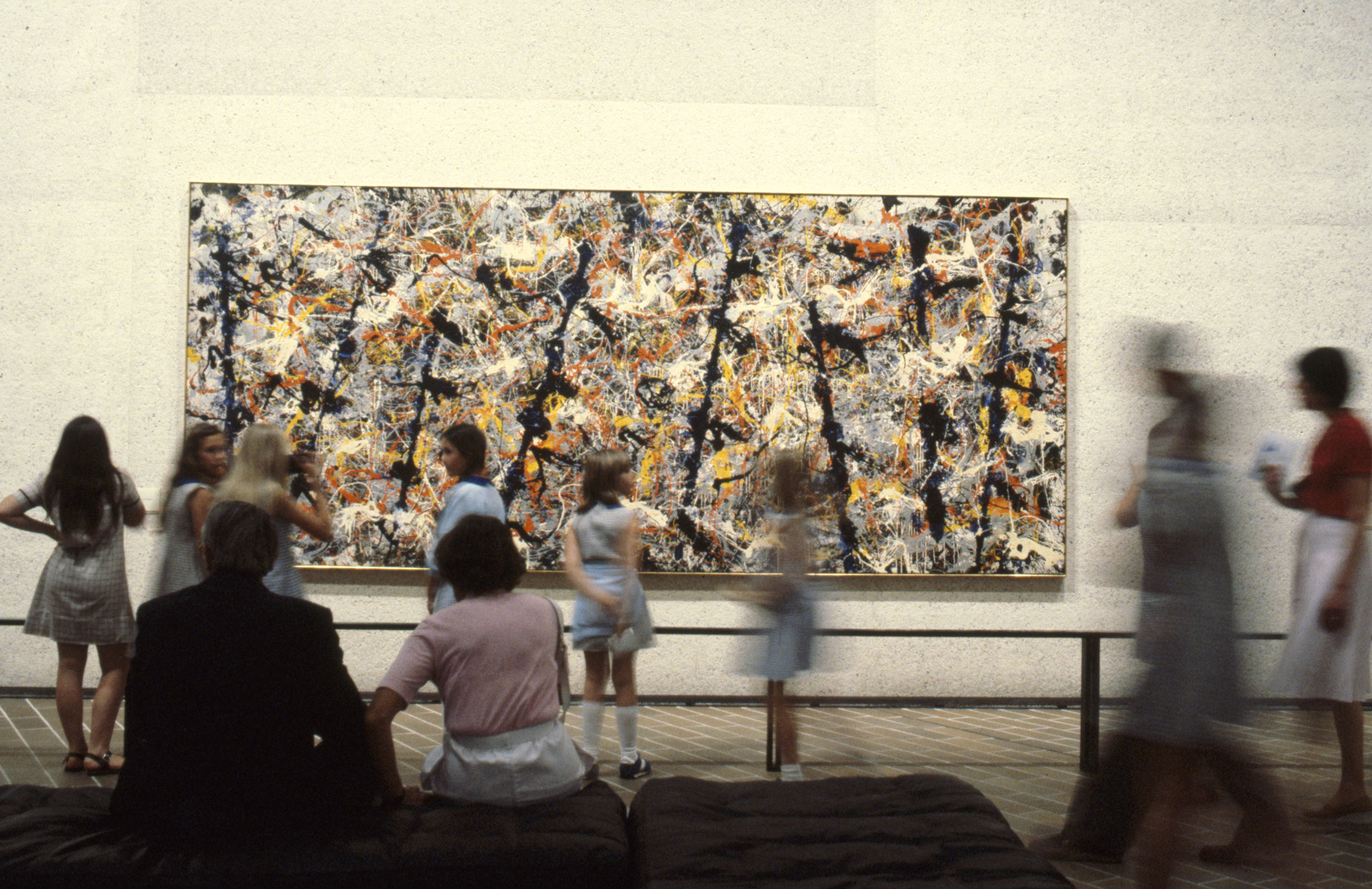 <i>Blue Poles</i> by Jackson Pollock on display at the National Gallery of Australia, 1982.
