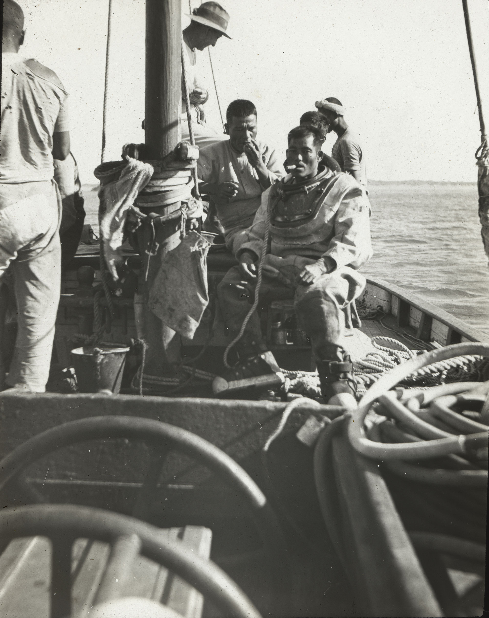 Japanese crew on a boat owned by Victor Kepert (in the hat), Broome. Photo taken in 1914 or in the early 1920s