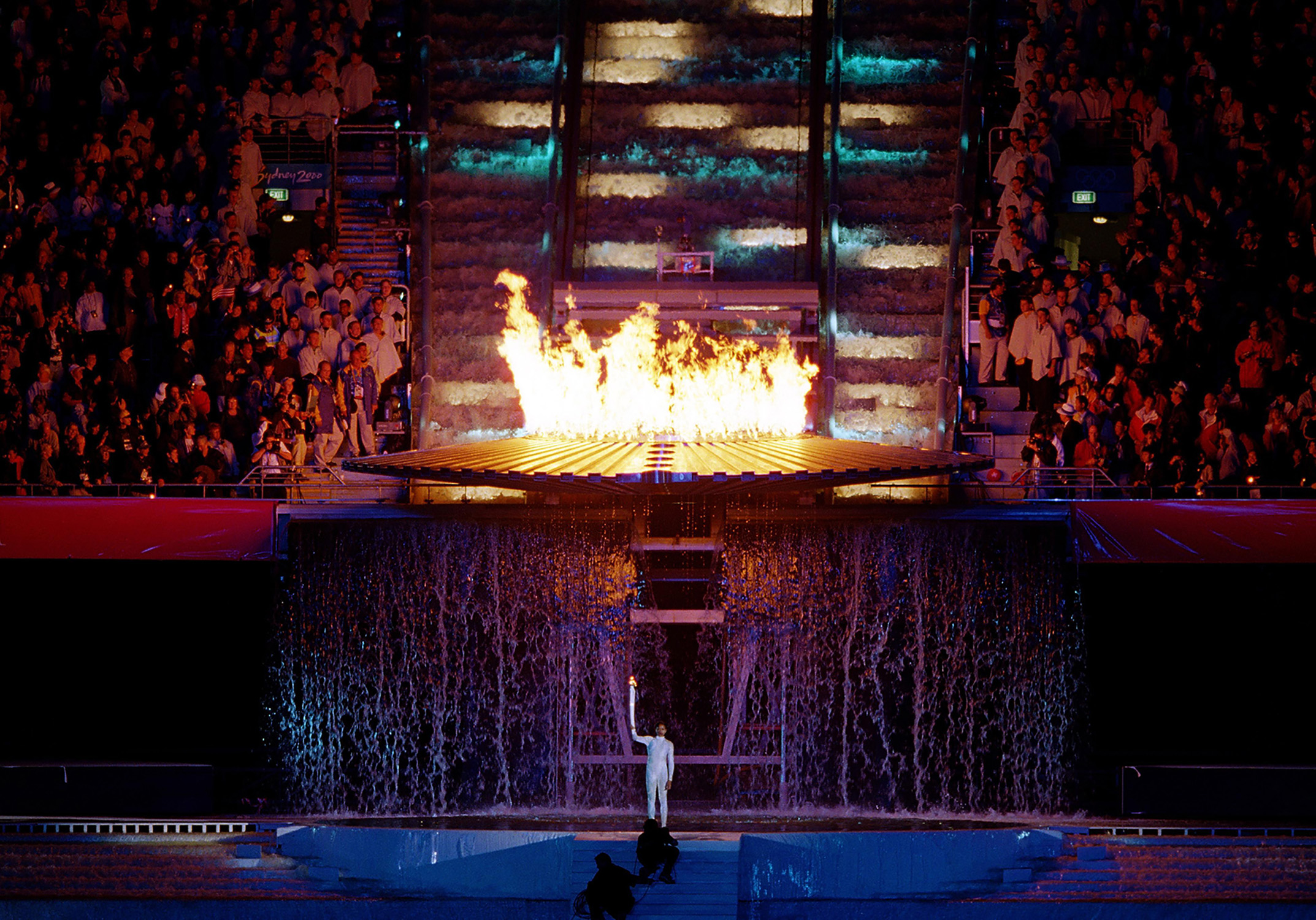 Cathy Freeman after lighting the Olympic flame at the Sydney Olympics Opening Ceremony, 15 September 2000
