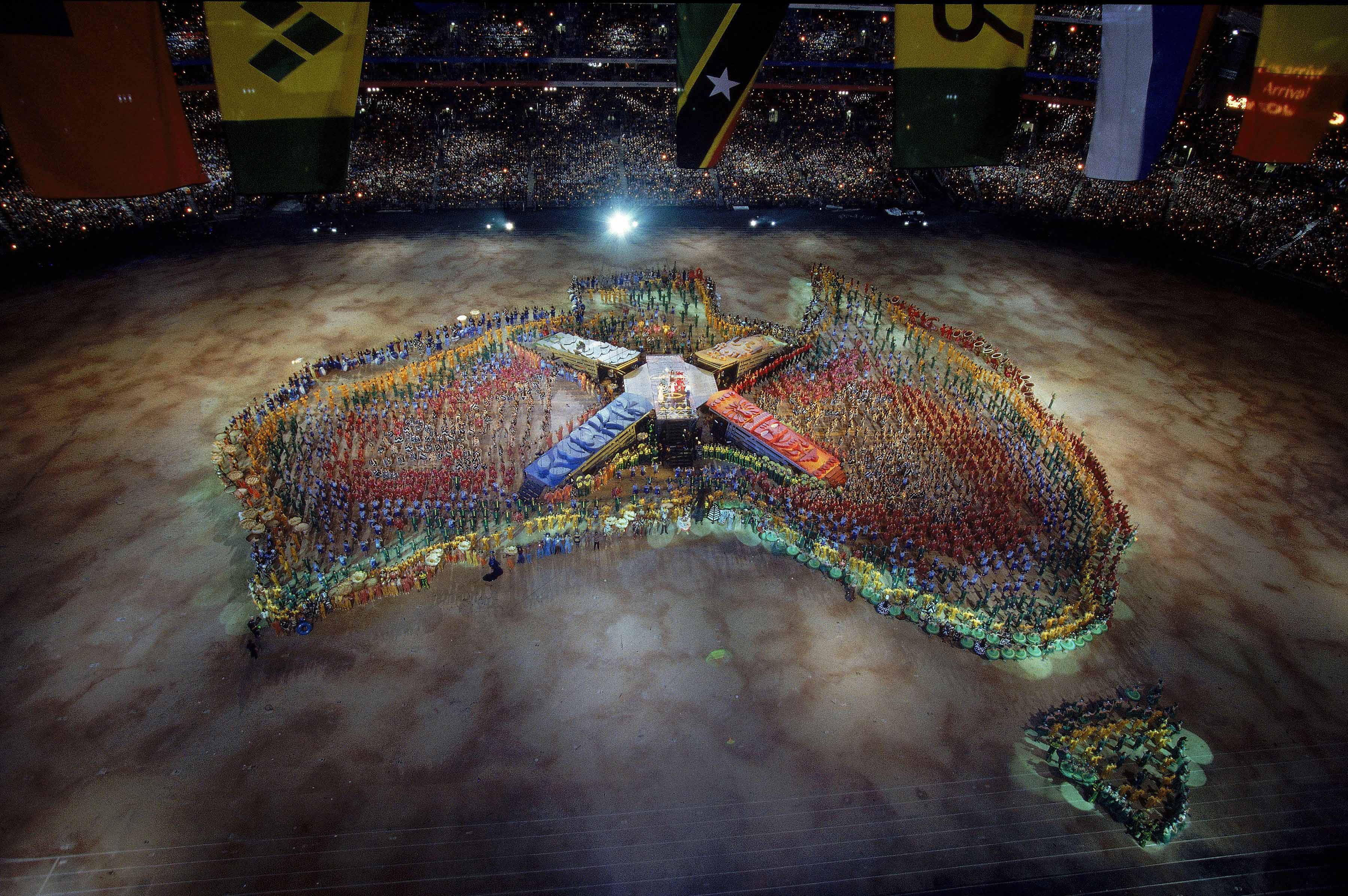 Performers create a map of Australia during the Opening Ceremony of the Sydney Olympics, 15 September 2000