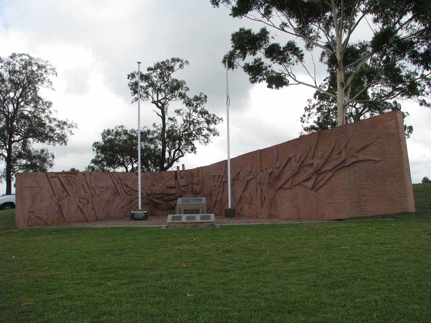 Photograph of a large sculpted memorial in a park