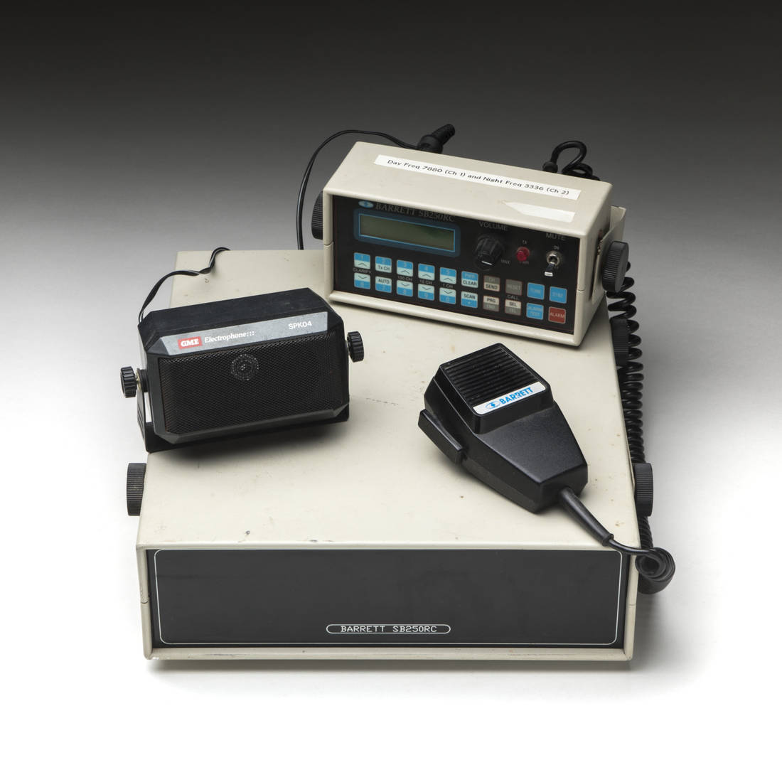 Radio with handset, speaker, and antenna