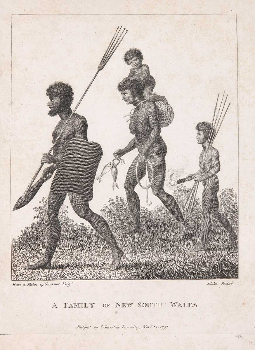An engraving depicting an indigenous man, woman and two children moving through a landscape. The father figure appears at the front carrying a shield and a spear, the mother is in the background carrying a baby on her shoulders and a fishing line and hooks in her hands, a small child at the rear carries a torch and a number of smaller spears. Beneath the image is the title, 'A FAMILY OF NEW SOUTH WALES'.