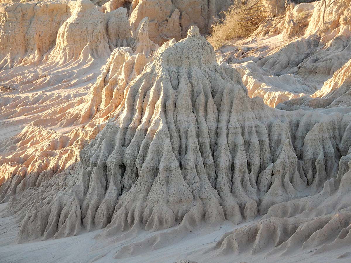 <p>A lunette at Lake Mungo showing ancient soil layers, 2020</p>