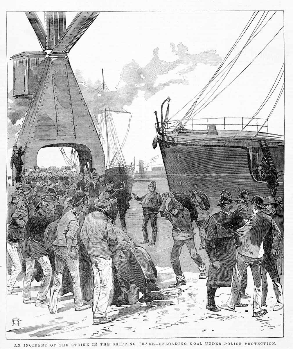 Black and white illustration depicting a wharf labourers protesting as police stand by. Printed text at the bottom reads  'AN INCIDENT OF THE STRIKE IN THE SHIPPING TRADE - UNLOADING COAL UNDER POLICE PROTECTION'.