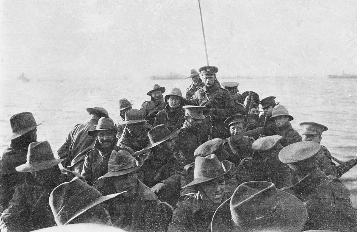 Black and white photograph of Australian soldiers in a boat.
