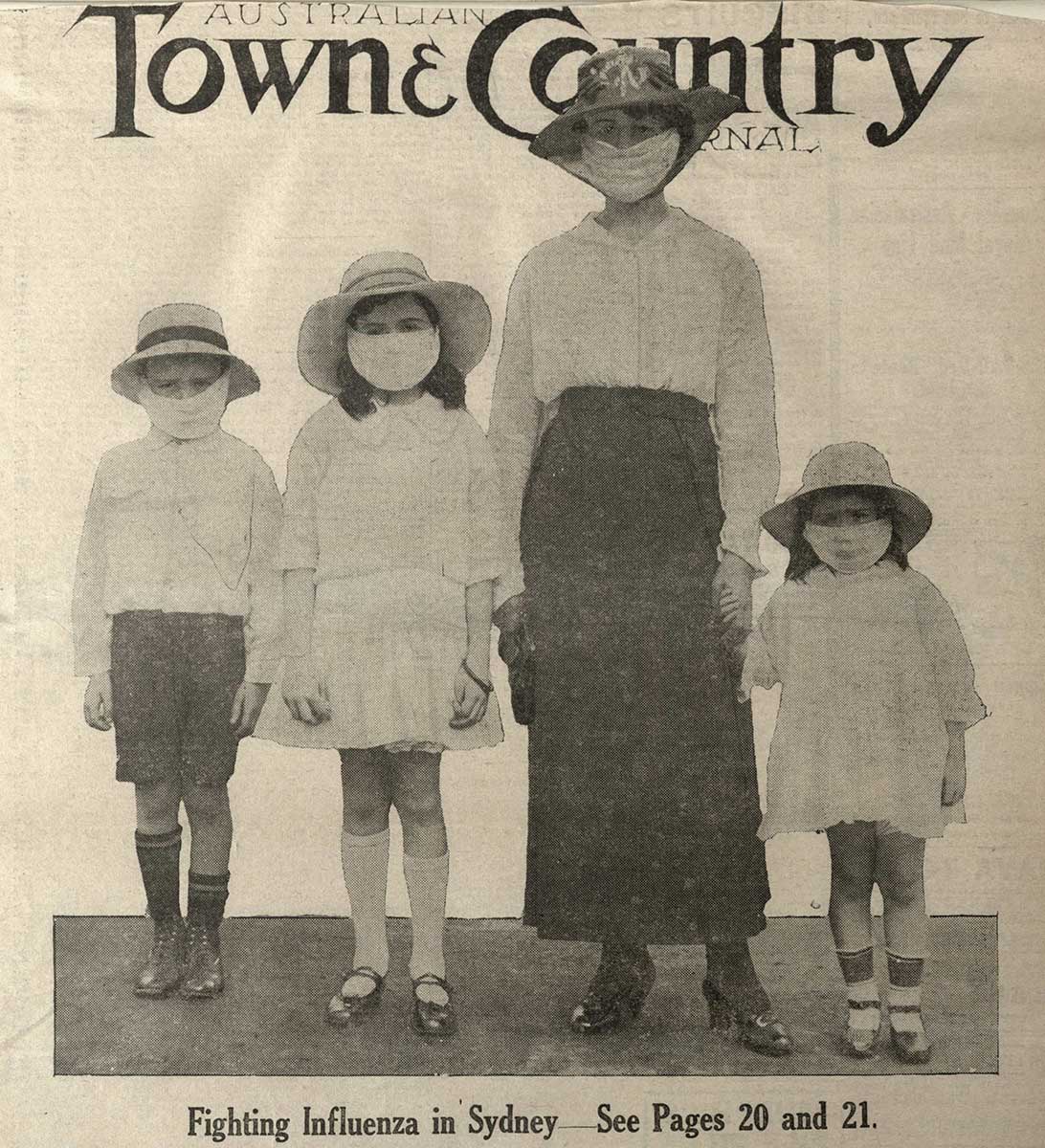 Cover of a publication titled 'Australian Town & Country. It features a woman and three children wearing facemasks. Printed underneath is "Fighting Influenza in Sydney – see pages 20 and 21."