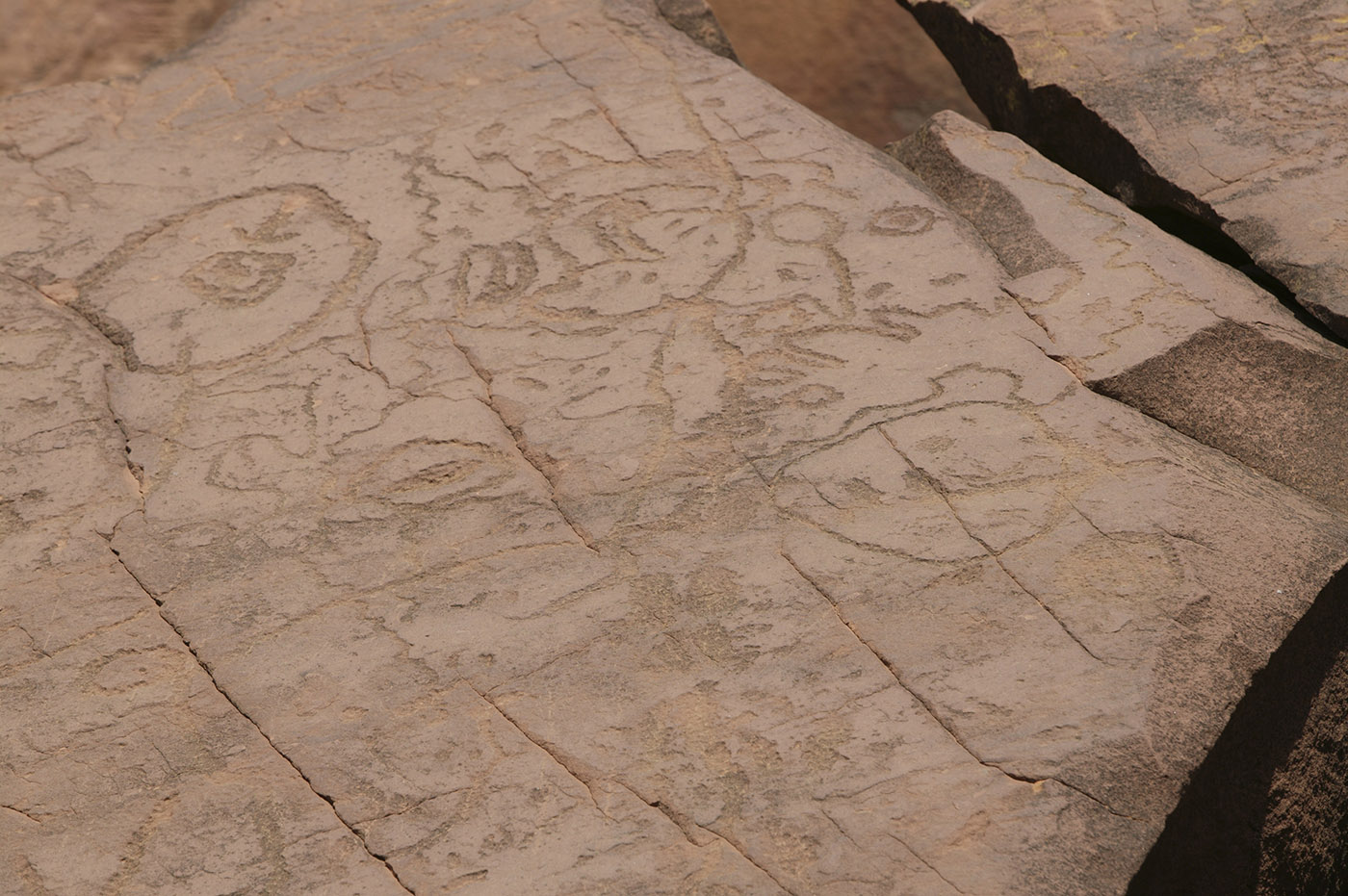 A photograph of patterns carved into rocks.