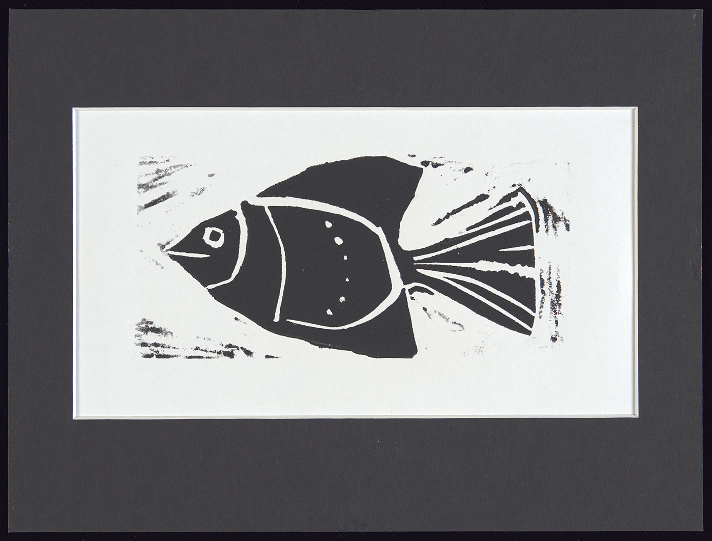 A black and white artist print of a fish.