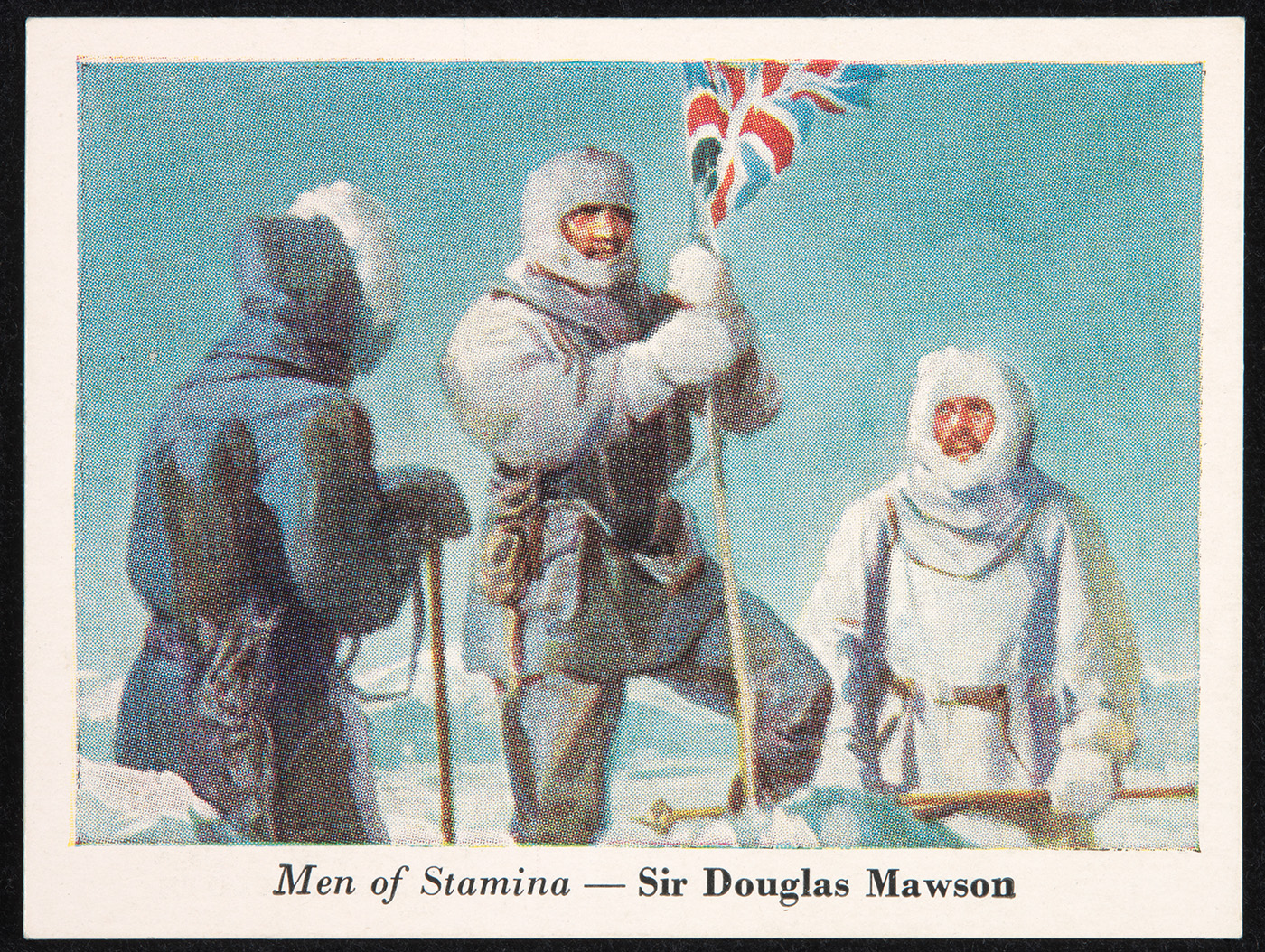 Three figures standing against a light blue and white background. The figure on the left in a dark jacket with white fur trim, faces away from the camera. The figure in the centre is in a light grey outfit with a balaclava, holding a flag. The figure on the right is in white, with a balaclava looking towards the flag.
