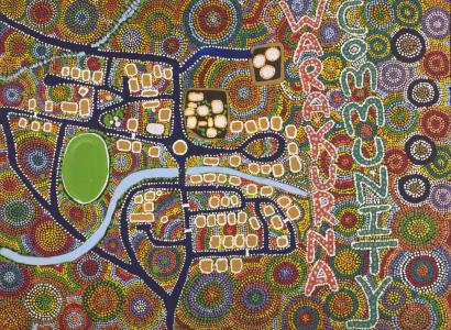 An acrylic painting on canvas showing an aerial view of a community in a multi-coloured landscape, with the text 'WARAKURNA COMMUNITY' written vertically alongside.