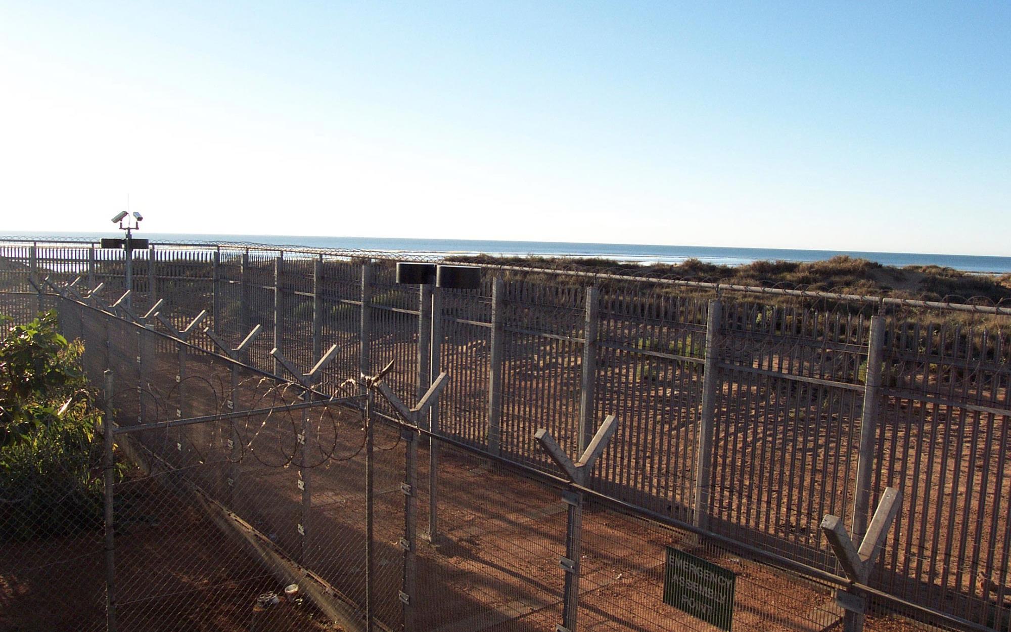View through the fence at the Port Hedland Detention Centre.
