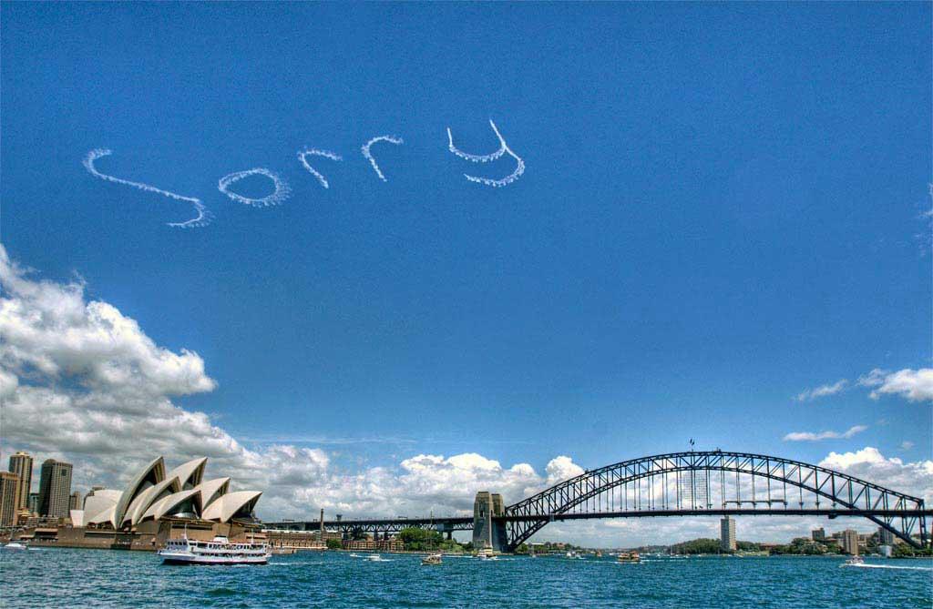 Sorry sky writing over Sydney Harbour.