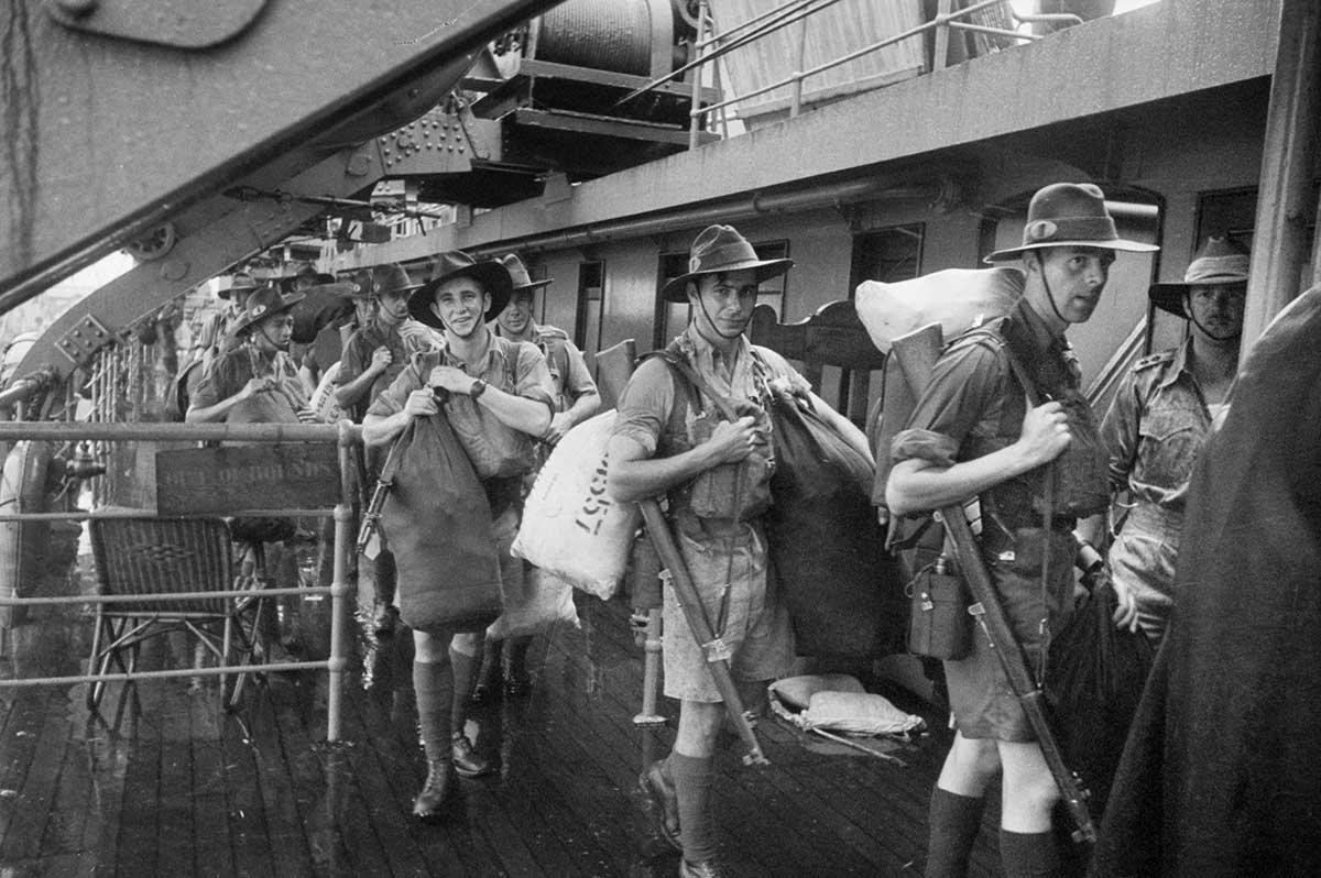 Black and white photograph of Australian troops getting off a ship.